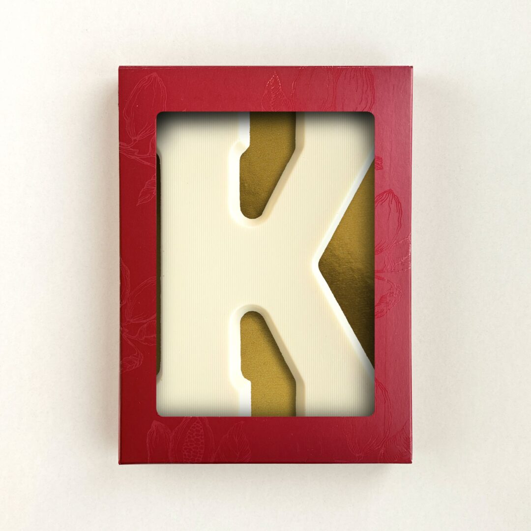Chocoladeletter K Wit