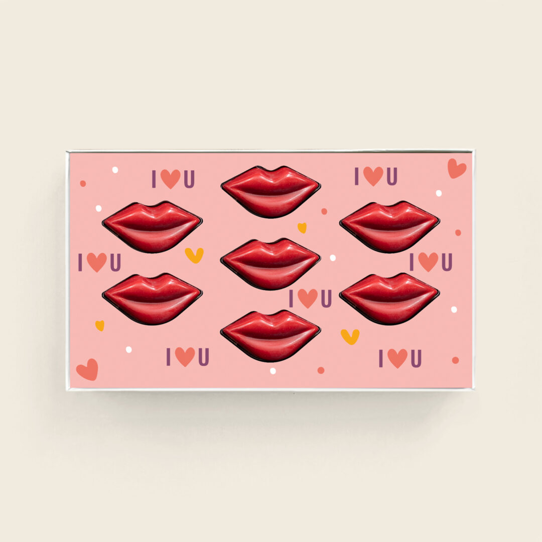 Heerlijke luxe bonbons in de vorm van rode chocolade lipjes in een luxe geschenkdoos met mmoderdag design. Ook leuk voor Valentijn. Tasty Present - Gepersonaliseerde chocolade en zoetwaren
