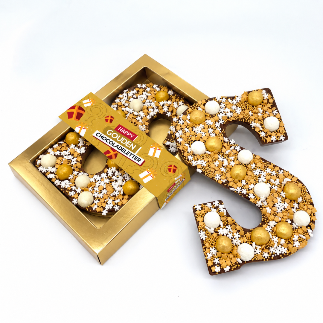 „Happy Truffel“-Schokoladenbuchstabe in Gold in einer luxuriösen goldenen Geschenkbox