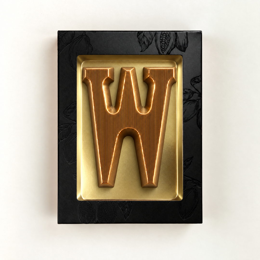 Melk Chocoladeletter W met bronzen finish. Leuk als relatiegeschenk